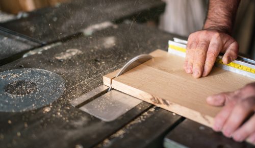 Carpenter working on the circular saw